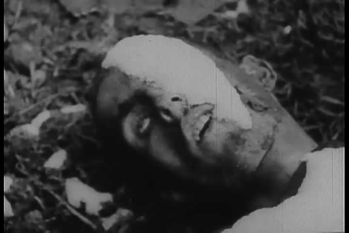 1940s - Footage of Dachau Nazi Concentration Camp victims and gas chambers.