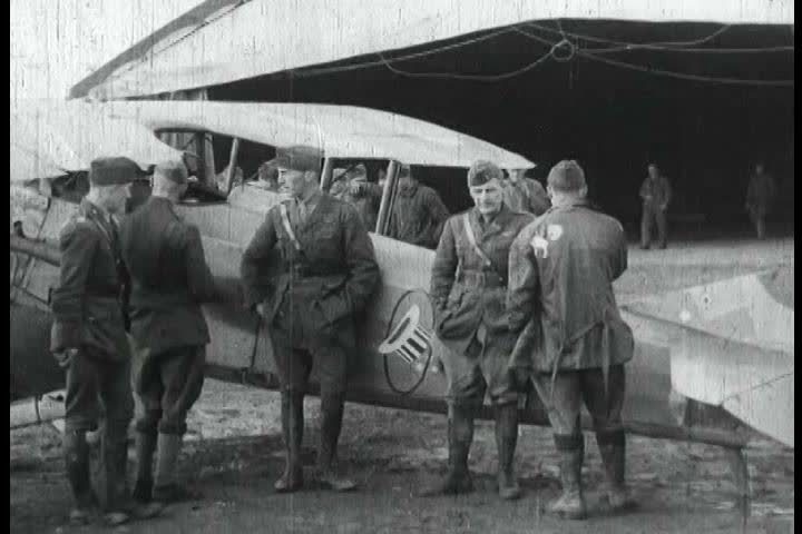 1910s - Eddie Rickenbacker and the 94th Aero Squadron receive medals for their service in World War One.