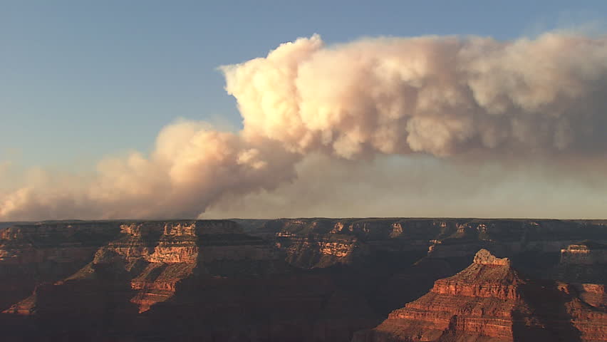 Tilt up from canyon to smoke