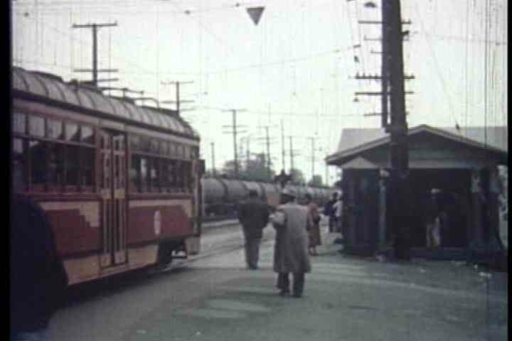 1950s - An establishing shot of Watts in Los Angeles in 1957.