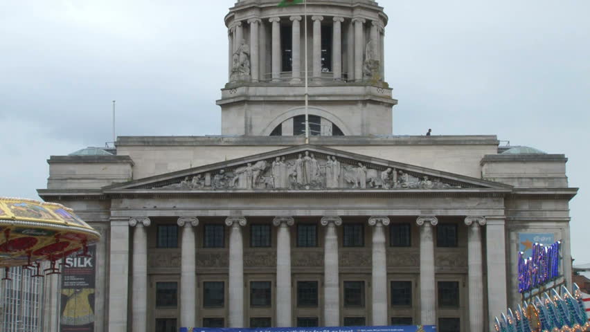 NOTTINGHAM, UK - AUGUST 2012: The Nottingham Council House and travelling fairground in Old Market Square.