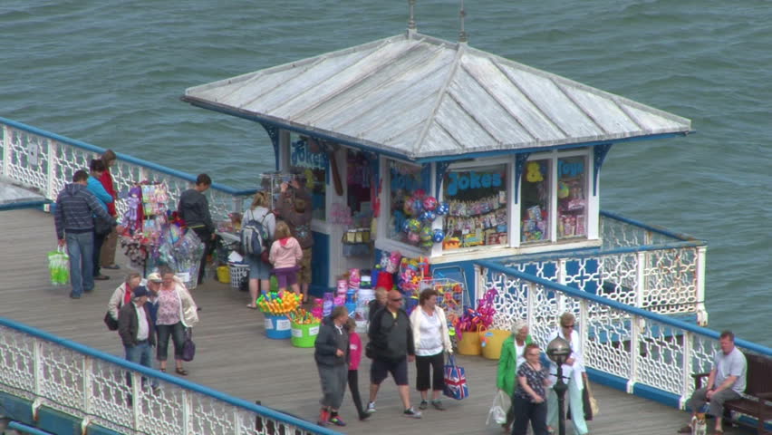 LLANDUDNO, UK - JULY 2012 : A hut selling gifts and souvenirs on a pier.