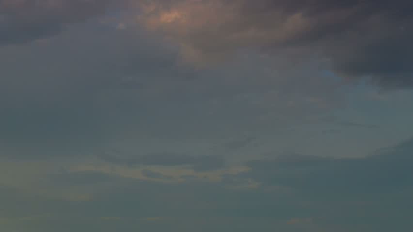 sky with clouds after storm at sunset time lapse shot in 6K resolution