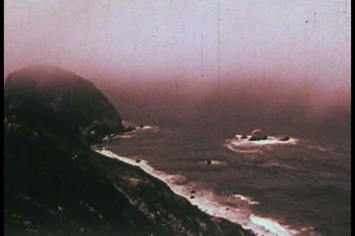 1960s - Sights of the golden gate are shown, the bridge, the fog and the landscape.