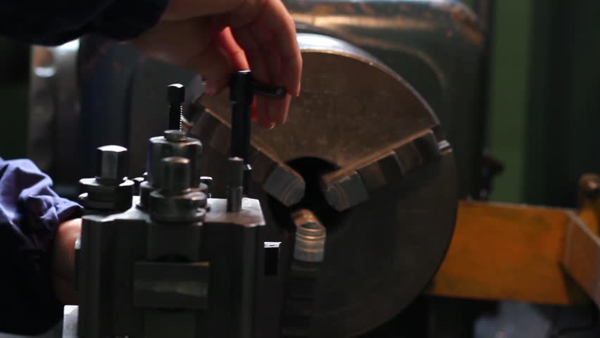worker on the lathe