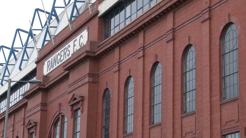 GLASGOW, UK - OCTOBER 2011: Historic red brick Bill Struth Stand at Ibrox Stadium with Rangers FC in writing on the top.