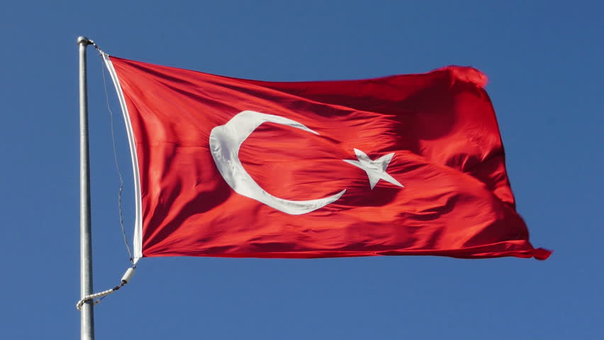 Turkish flag on a blue sky background
