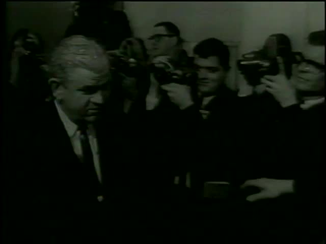 District attorney Henry Wade walks in Dallas county criminal courts, Texas circa 1964-MGM PICTURES, UNIVERSAL-INTERNATIONAL NEWSREEL, USA, filmed in 1964