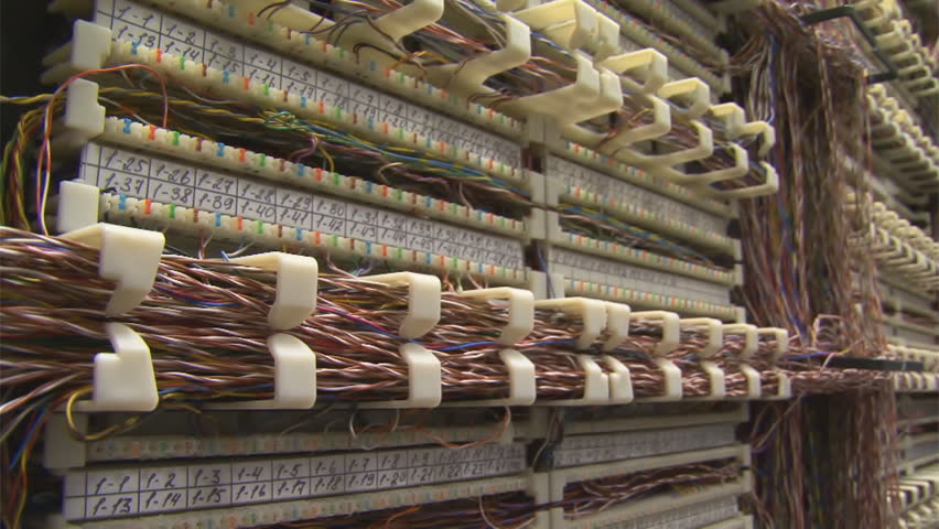 Panning on frame with wires in server-room