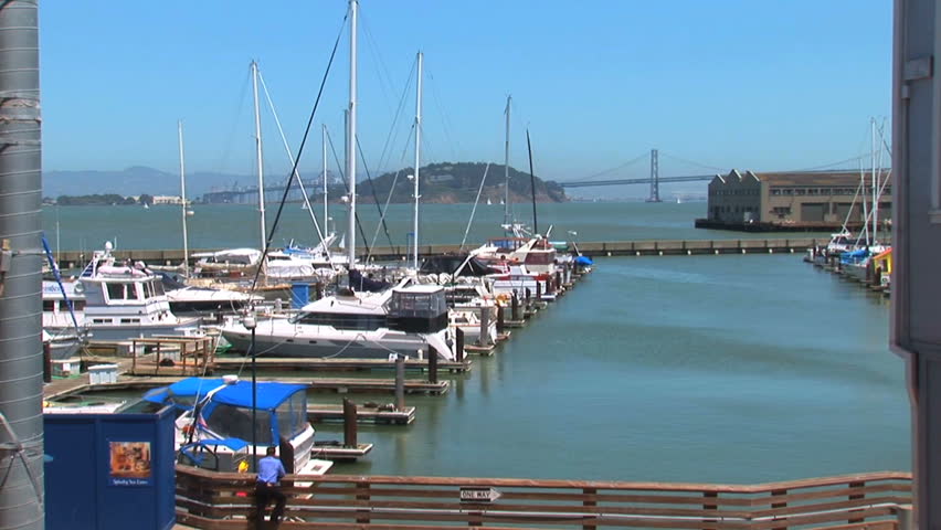 Shot of the harbor in the Fisherman's Wharf area in San Francisco with the Bay Bridge in the background