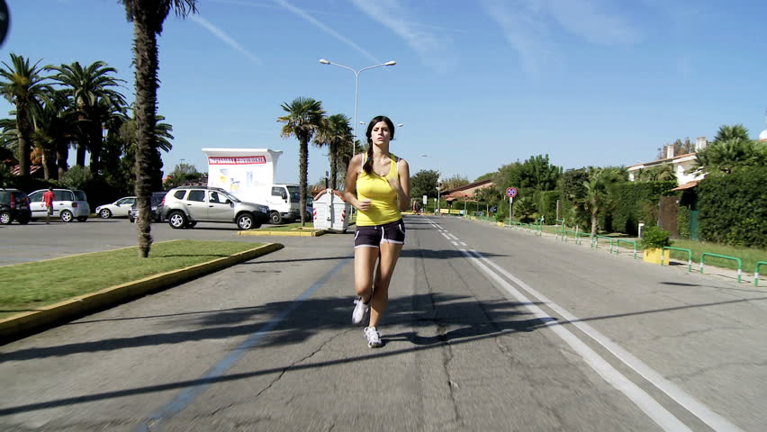 Fit gorgeous woman running happy/Feeling active strong and healthy for my body dolly shot