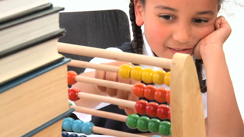 Cute african american schoolgirl early learning counting 