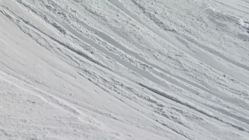skiing freestyle filmed from behind; 2 shots