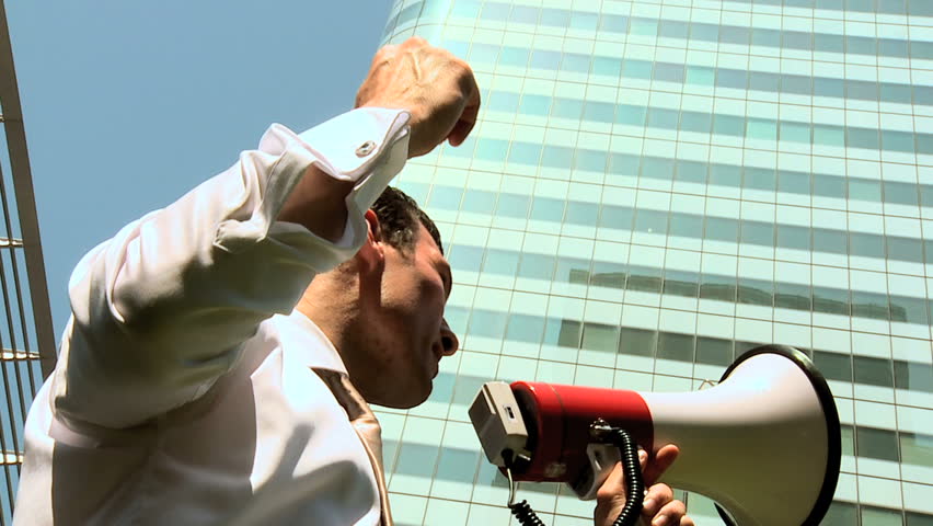Young city businessman announcing  his achievements with a megaphone