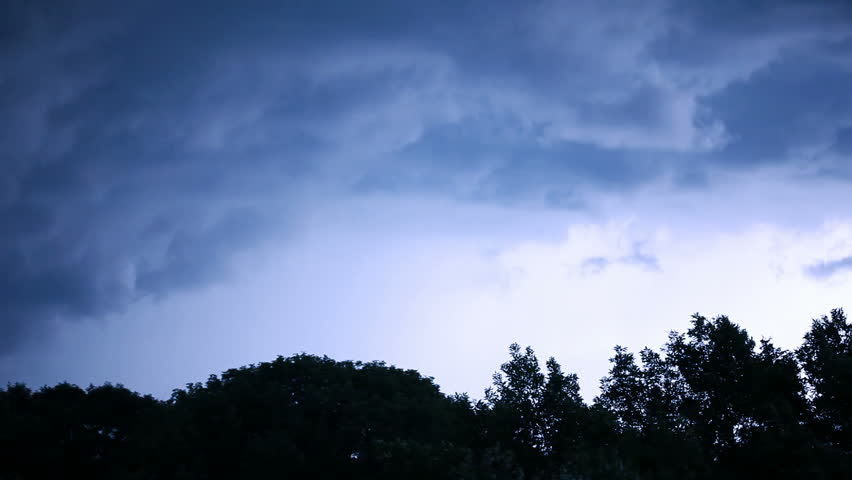 Stormy clouds with lightning flash