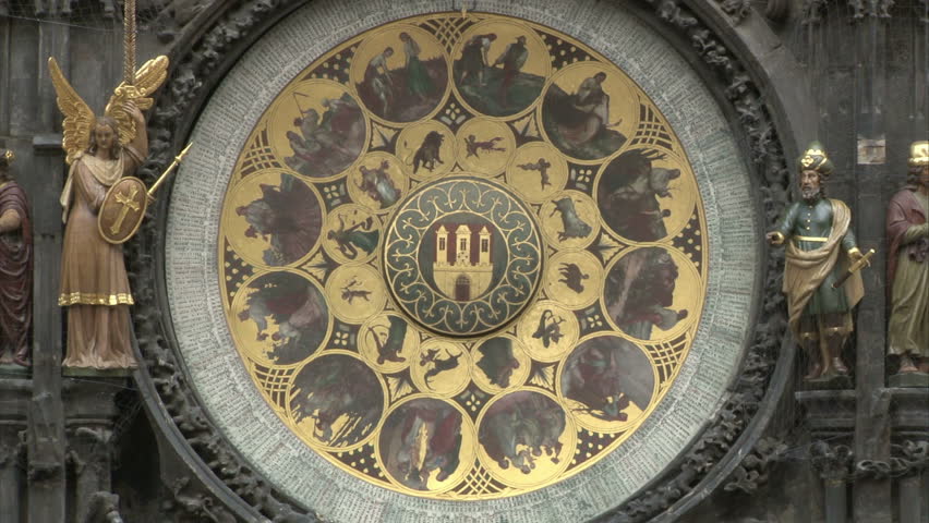 Astronomical clock on gothic Old Town Hall tower in Prague. Panning up.