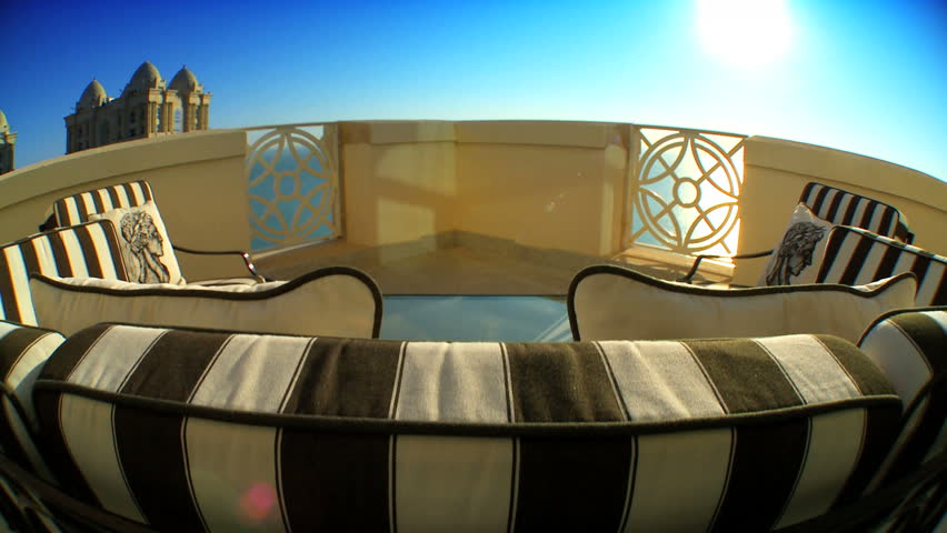 Comfortable lounging furniture on balcony of luxury apartment