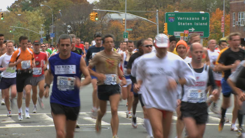 NEW YORK CITY - NOVEMBER 1: With the Verrazano Bridge behind them, runners look to conquer the rest of the course in the 2009 New York Marathon.