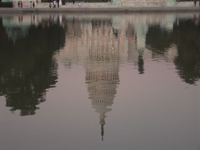 Tilt up to US Capitol in Washington, DC at dusk