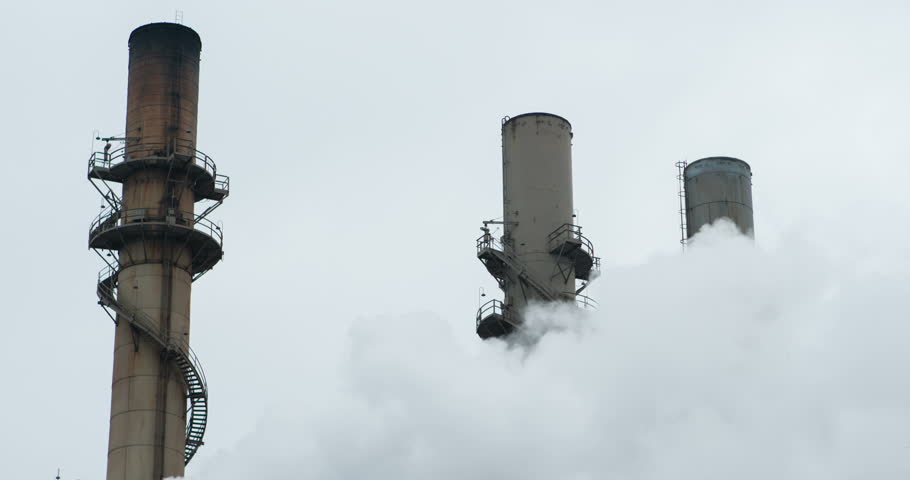 Industrial plant with smoke from production 4k