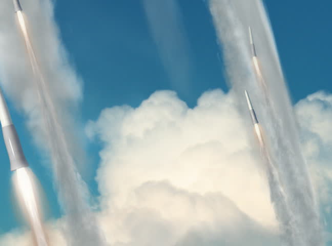 Looping animation of a group of missiles being launched and in flight.