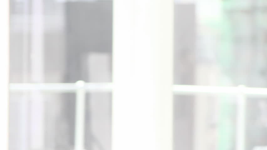 Assertive businesswoman talking on headset in a call center