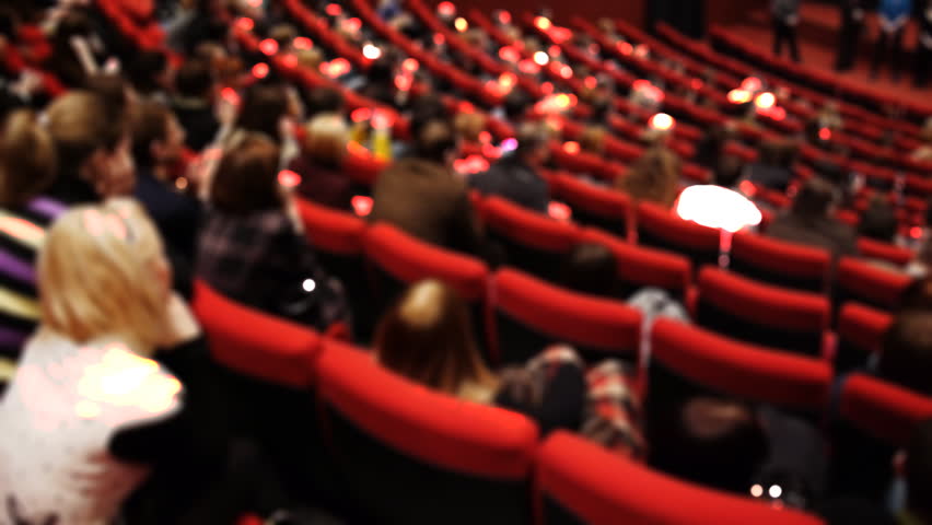 Audience in the cinema hall is applauding, with Sound.