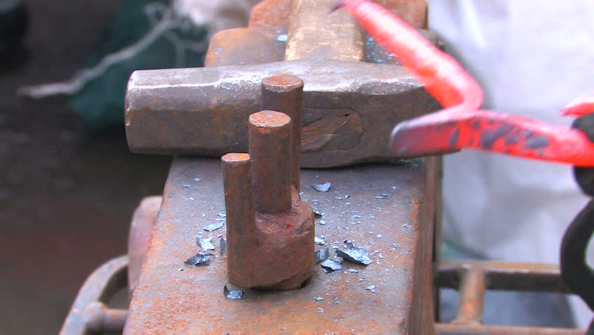 HD View of blacksmith demonstration in Blacksmith Shop, closeup, Canon XH A1, FullHD video, 1080p, 25fps, progressive scan 