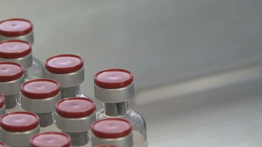 medicine bottles in pharmaceutical factory before packaging