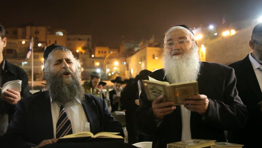 JERUSALEM, ISRAEL Ã¢â¬â SEP 18: Midnight prayers are reciting Slihot (penitential prayers) and imploring until Yom Kippur at the Western Wall, September 18, 2009.