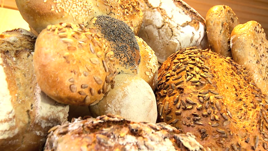 Selection of fresh organic breads baked with healthy nuts & sesame seeds