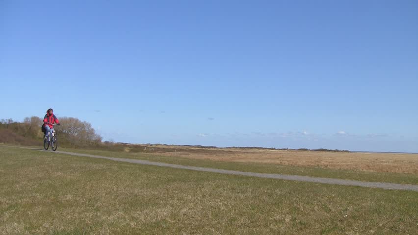 Biker on dike
