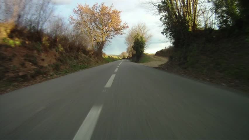 Fast drive along country road