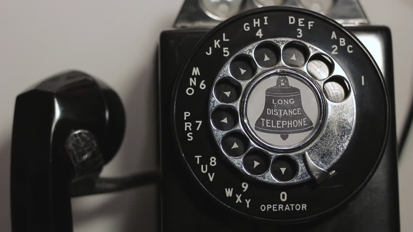 Dialing with an old rotary payphone