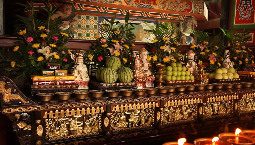 LESHAN, CHINA - AUGUST 24: Buddhist monks performing ceremony inside Baoguo monastery, Leshan, Sichuan, China, August 24, 2009