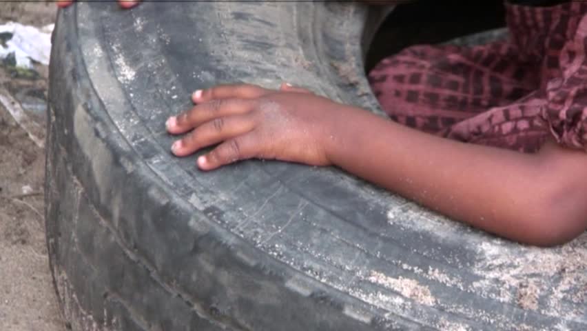 African child who plays alone