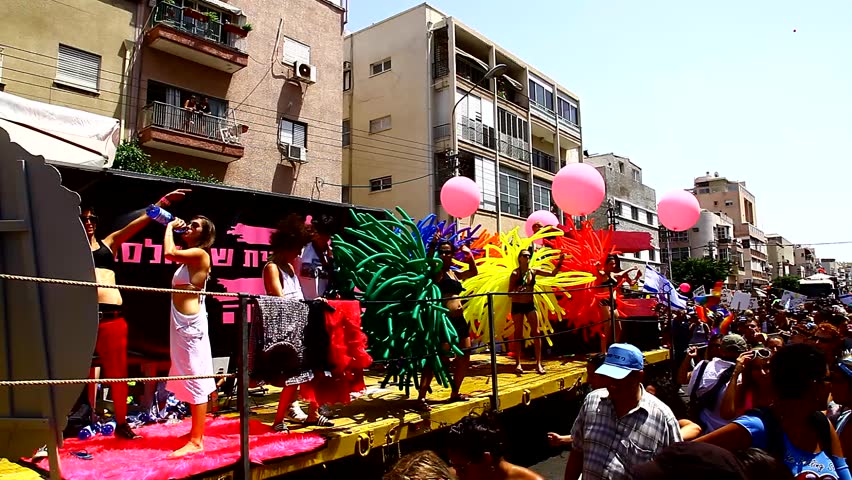 TEL AVIV, ISRAEL - JUNE 11: Participants in the 10th Annual Pride Parade marching through the streets in Tel Aviv, Israel, June 11, 2010