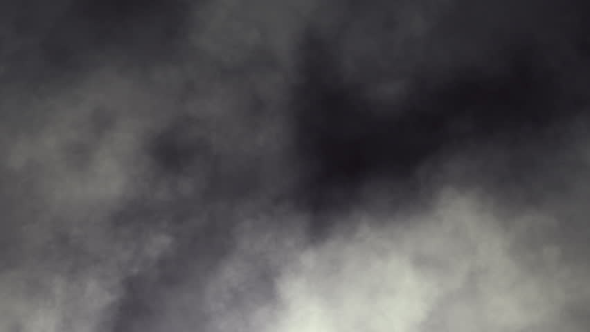 Dark swirling smoky clouds looping animation