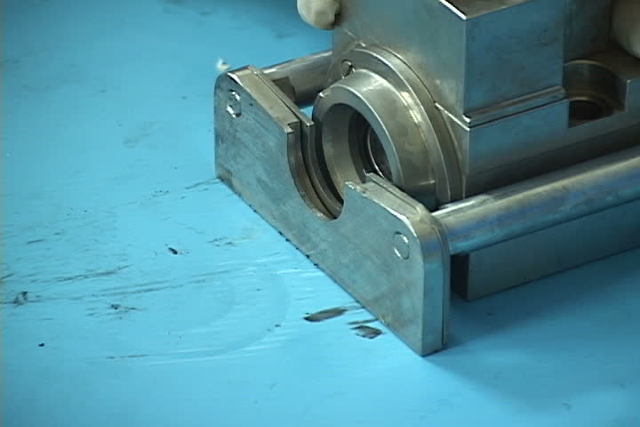 mechanical part of machine (hand work