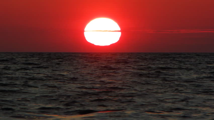 Sea sunset. Sun Dipping Below