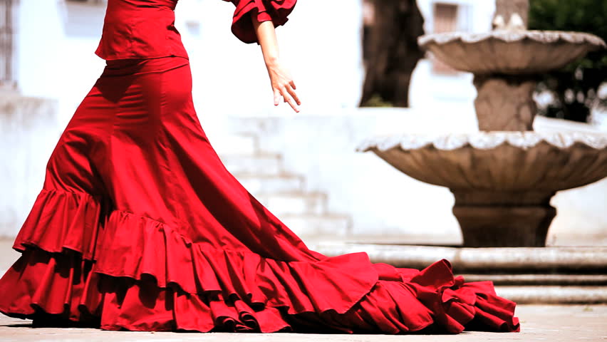 Lower body of dramatic spanish flamenco dancer in Seville, Spain