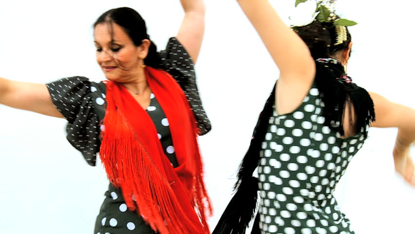 Two ladies dancing dramatic traditional Spanish flamenco, Seville, Spain 