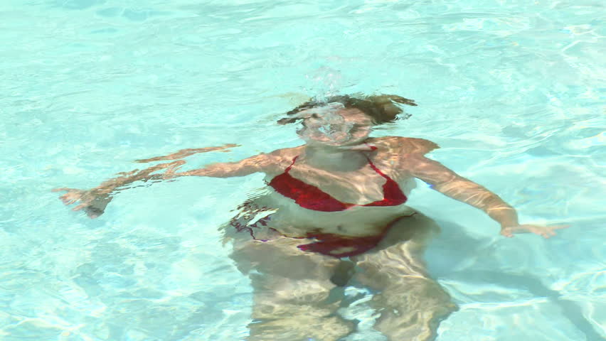 Young woman in pool