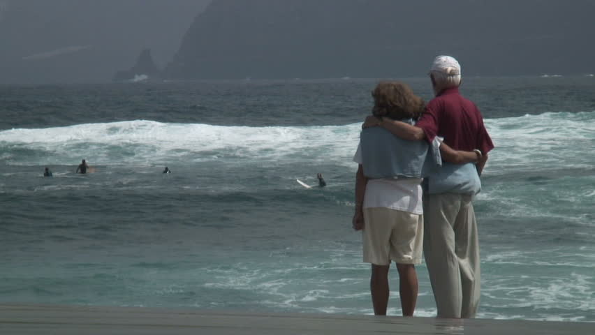 older couple arm in arm