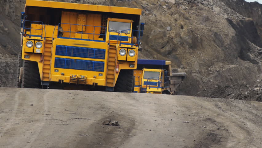 Off-road dump truck in the open pit mine