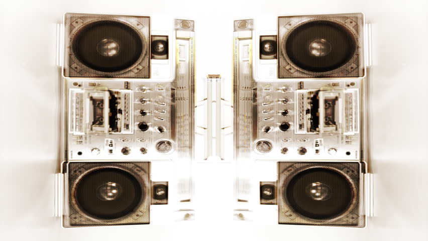stop-motion of a fantastic looking retro ghetto blaster with cassette tape spilling out 