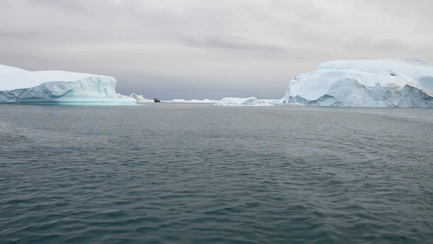 Sailing in the famous Ilulissat icefjord in Greenland. The icefjord is on UNESCO's World Heritage List.