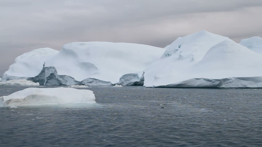 Sailing in the famous Ilulissat icefjord in Greenland. The icefjord is on UNESCO's World Heritage List.