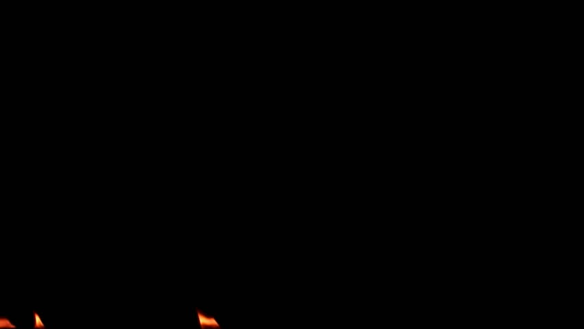 Fire flame isolated on black background. 8x slow motion
