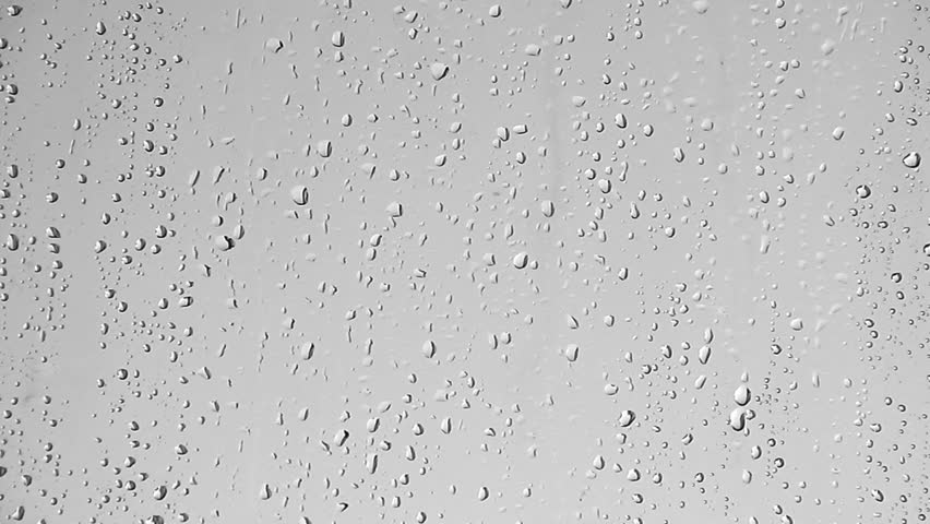 HD monochromatic rain water drops on the windows glass. You can change the drops and background to any color you want using video editing software.
